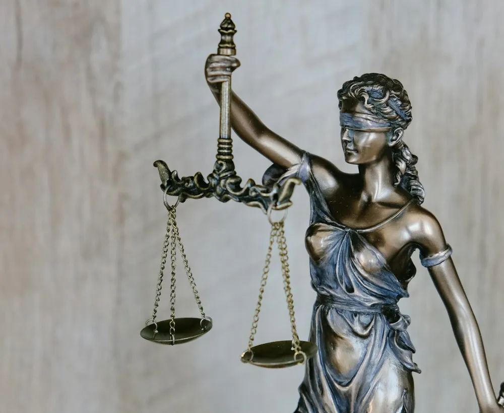 Scales of justice, representing legal and regulatory alignment.