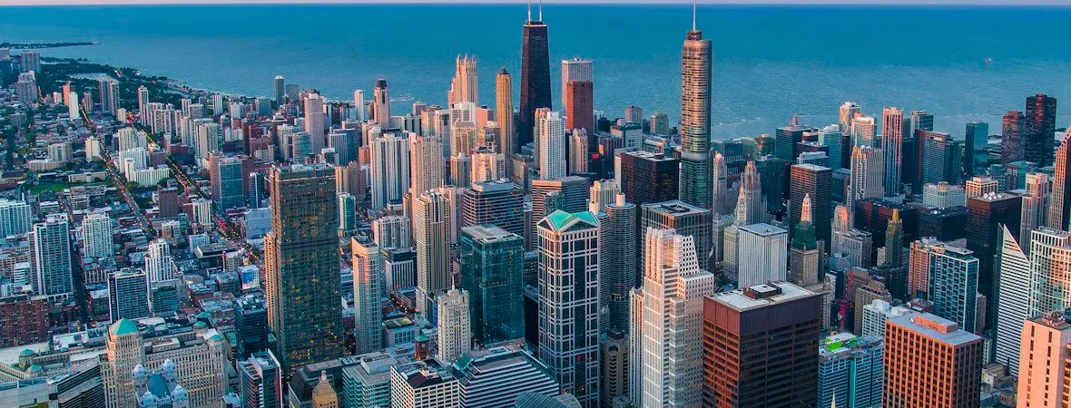 A city skyline at dusk.